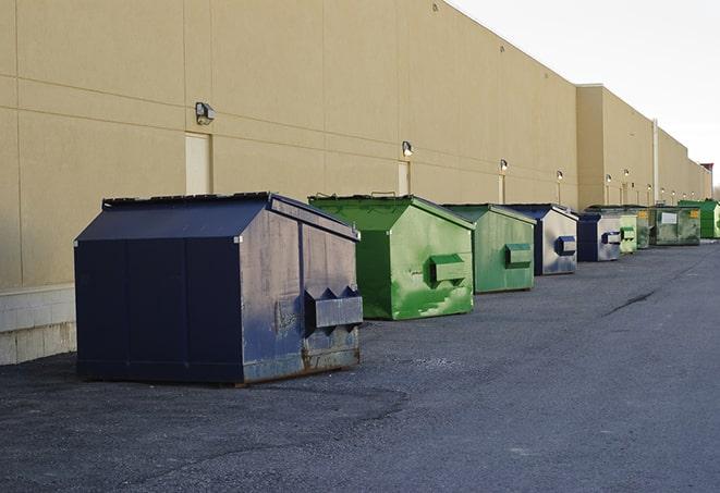 a site supervisor checking a construction dumpster in Bristol, FL